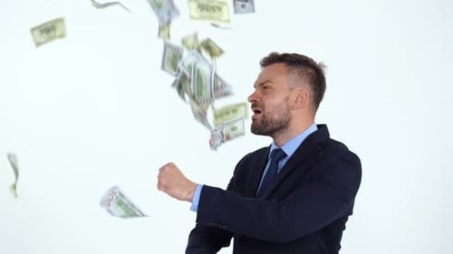 Man in Suit Surrounded by Falling Money