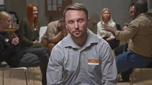 Man Attends Group Therapy Session