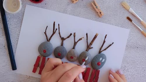 Making Diy Merry Christmas Deer on Greeting Card Postcard Made of Pebbles Sea Stones Clothespins and