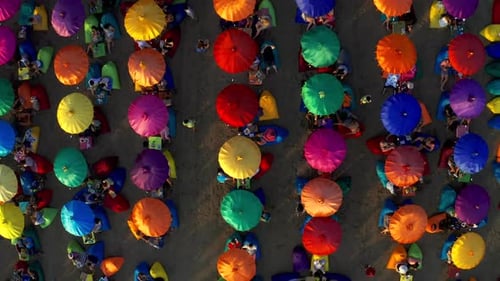 Colourful Beach Umbrellas and People Enjoying the Summer in Seminyak Beach