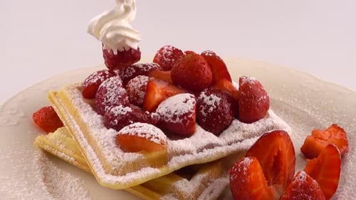 Waffles with Strawberries and Whipped Cream Close Up