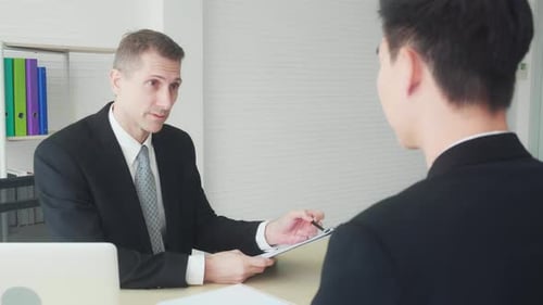 Young asian businessman job interview with manager and successful at the office.