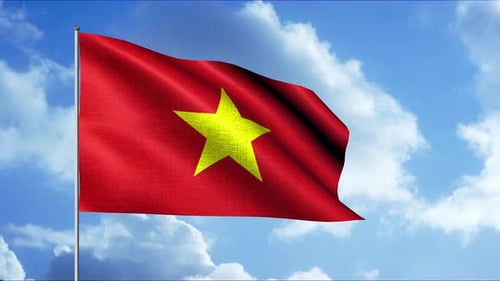 Waving Flag of Vietnam Against a Clear Blue Sky