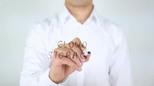 Man Writing Cloud Storage on Clear Screen