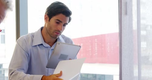 Businessman using digital tablet