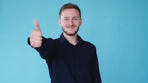 Man Gestures Thumbs Up and Thumbs Down