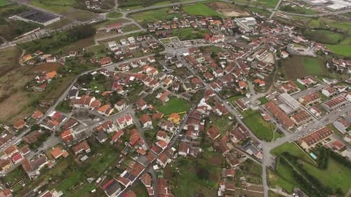 Aerial View of Small European City with Modern Residential Suburb Neighborhood