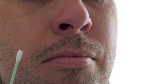 Close Up of Man Receiving Nasal Swab