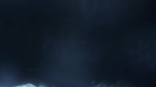 Dramatic Clouds Floating in a Blue and Grey Sky