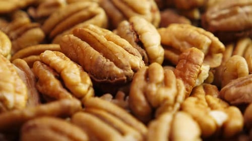 Pecan Nuts Background. Closeup Pekan Seeds