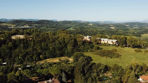 Drone Flying Above Magnificent Peaceful Houses on Green Tree Hills, Mediterranean Landscape Panorama