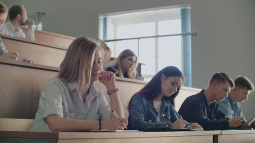 Students Taking Notes in Lecture Hall