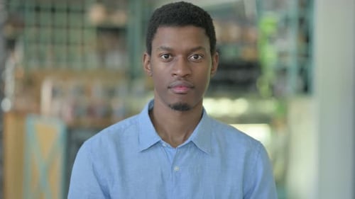 Young Adult Man Portrait, Looking at Camera
