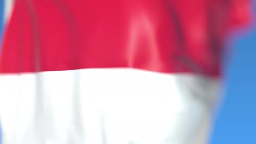 Realistic Red And White National Flag Waving Against Blue Sky