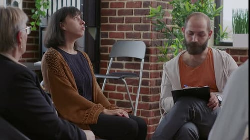 Close Up of Nervous Woman with Alcohol Addiction Having Mental Breakdown at Aa Meeting