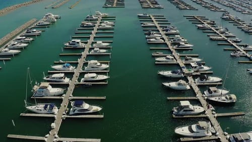 Aerial Drone Shot of Yacht and Sailboats Moored at the Quay