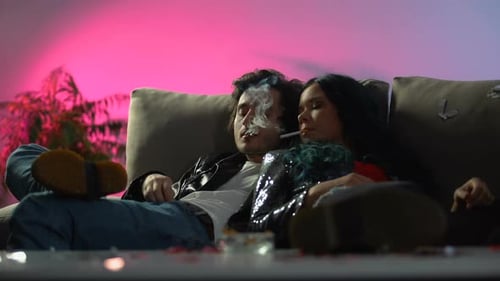 cigarette couple smoking hi-res stock photography and images Cigarettes and little kisses