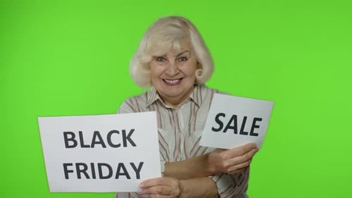 Senior Grandmother Showing Sale Word and Black Friday Inscription Advertisement Banners, Discounts