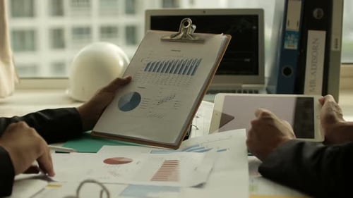 Business Meeting at Urban Office Desk