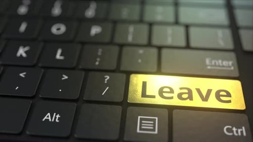 Black Computer Keyboard and Gold Leave Key