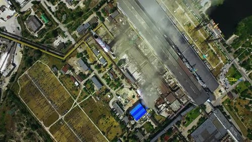 Industrial Factory Complex with Smokestacks at Sunny Day