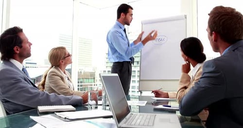 Team Brainstorming During a Meeting in a Modern Office