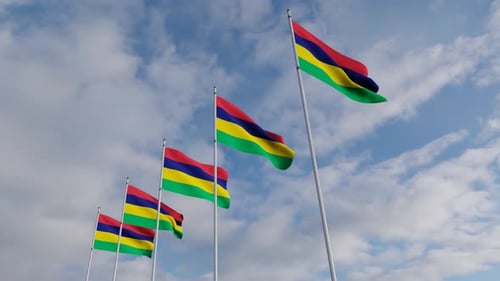Waving Mauritius National Flags Against Clear Blue Sky