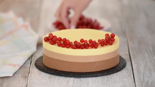 Triple Chocolate Mousse Cake Decorate with Fresh Berries