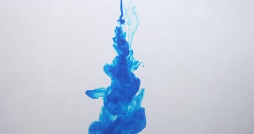 Bright Blue Liquid Descending on White Background