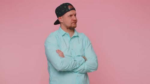 Man With Crossed Arms Looking At The Camera