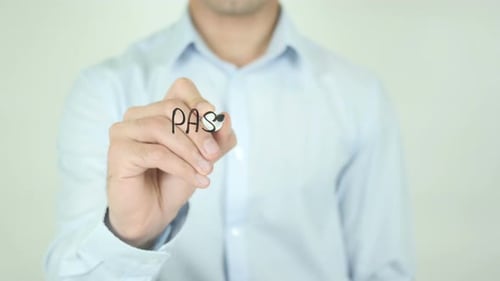 Man Writes Password Security on Transparent Surface