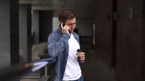Man Talking on the Phone in Urban Setting