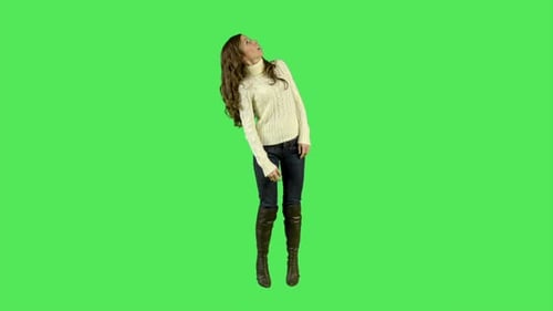 Startled woman recoils and falls on chroma key
