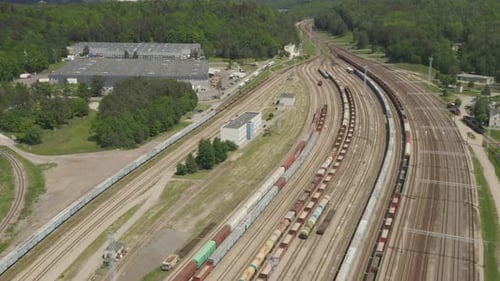 Railway Track Junction with Train Wagons Waiting to be Loaded