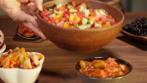 Colorful Salad Dishes on Wooden Table