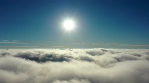 Above the clouds. Sunrise foggy morning at downtown city.