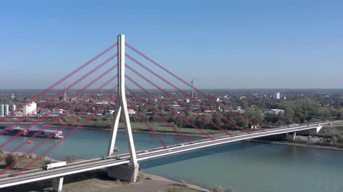 Vehicles Crossing a Cable Stayed Suspension Bridge Crossing a River