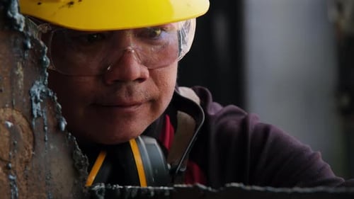 Construction Worker Focusing on Job Close Up