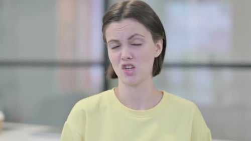 Portrait of Young Woman Showing No Sign By Head Shake Denial