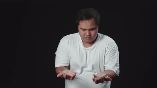 Man Shuffling and Dividing Deck of Cards