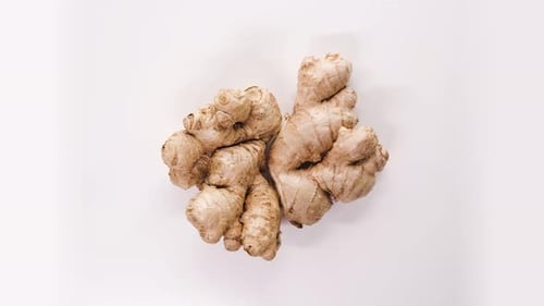 Raw Ginger Rotate or Spin on White Background Top Down View
