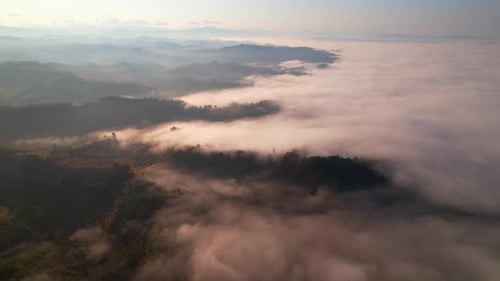 Flying over the clouds during morning sunrise. wonderful morning sunrise natural Landscape.