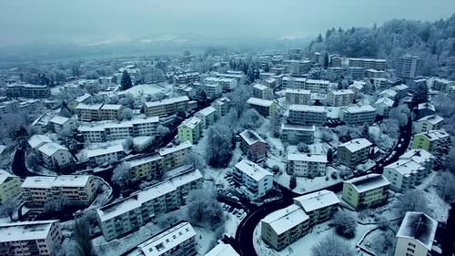 Aerial View of Village Houses at Winter Snow Season