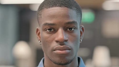 Close Up of Serious Young Adult Man