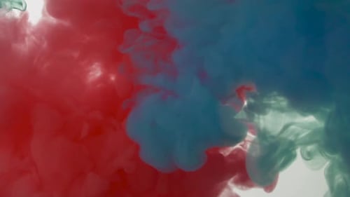 Red and Green Ink Spreading Abstractly