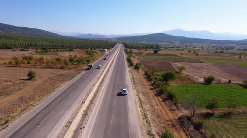 Scenic Highway Through Rural Landscape Aerial View