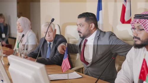 International Delegates Discuss Policy at a Corporate Meeting