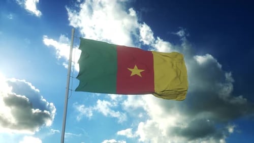 Cameroon Flag Waving in Blue Sky