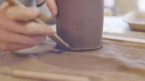 Crafting Clay Vase Base with a Pottery Tool