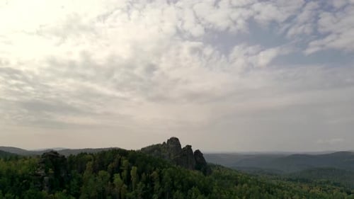 Aerial Hyperlapse of Rocky Peaks in the Mountains in Autumn.